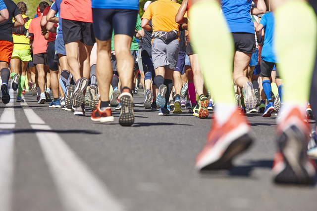Runners participate in a marathon. (Getty Images Bank)
