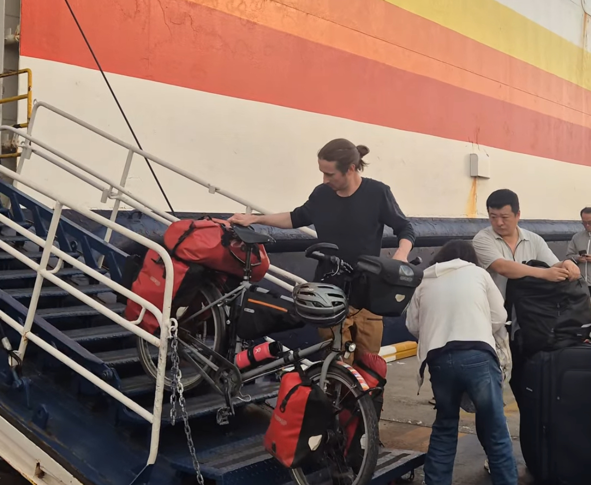 Philipp Springsguth disembarks from a ship at Incheon Port on Sept. 27, as he arrives in South Korea. (Springsguth and West)