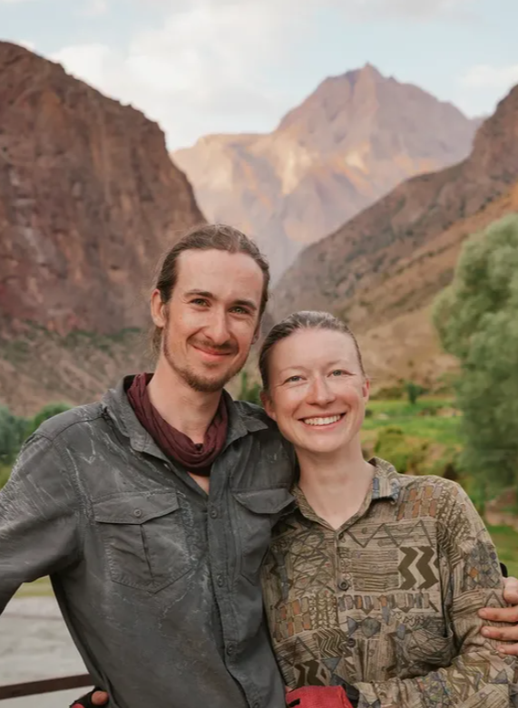 Philipp Springsguth and Maria West pose for a photo during their journey through Tajikistan. (Springsguth and West)
